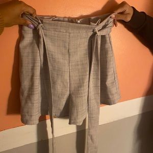 Grey shorts with belt